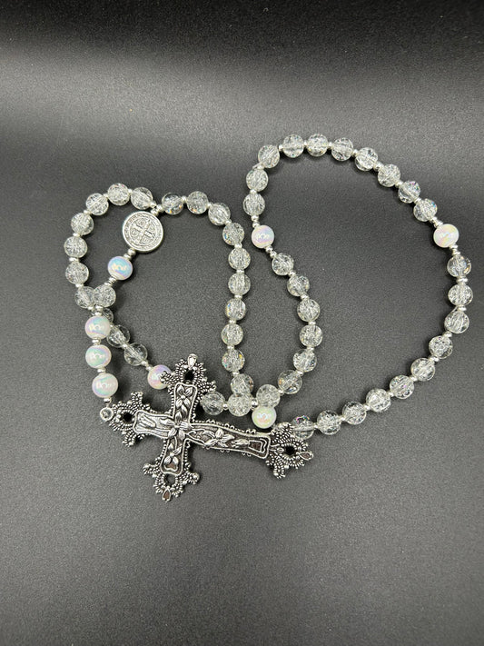 Catholic Rosary Black beads with Bronze Plated  Medal Centerpiece and a Clear Crystal 10 mm beads with a Sterling Silver cross. Green 10 mm gold spacers with a gold and emerald green cross.